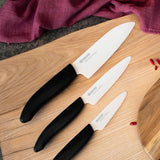 KYOCERA GEN NATURE black ceramic knife with sleek handle, showcasing sharp blade for precise cutting and kitchen use.