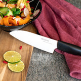 KYOCERA GEN NATURE black ceramic knife with sleek handle and sharp blade for precise cutting and slicing.