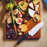 KYOCERA GEN NATURE black ceramic knife with sleek handle, sharp blade, ideal for precise slicing and culinary use