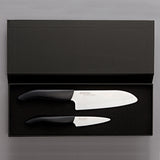 KYOCERA ceramic knife set with peeling and santoku knives, featuring sleek, sharp blades for precise kitchen cutting tasks.