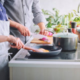 KYOCERA white ceramic knife, Chowa series, with sleek handle and sharp blade, ideal for precise kitchen cutting tasks.