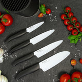 KYOCERA knife block with four GEN soft-touch knives, showcasing sleek black design and safety features.