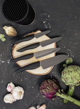 KYOCERA knife block with four SHIN knives and soft-touch handles, stylish kitchen knife storage and organization.