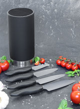 KYOCERA knife block with four SHIN knives and soft-touch handles, modern kitchen storage for high-quality cutlery.
