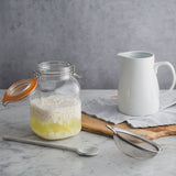 KILNER Clip Square glass jar for preserves, clear with metal clip lid, ideal for storing homemade jams and pickles.