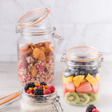 Clear KILNER CLIP SQUARE canning jar made of glass with a metal clip closure, suitable for preserving foods.