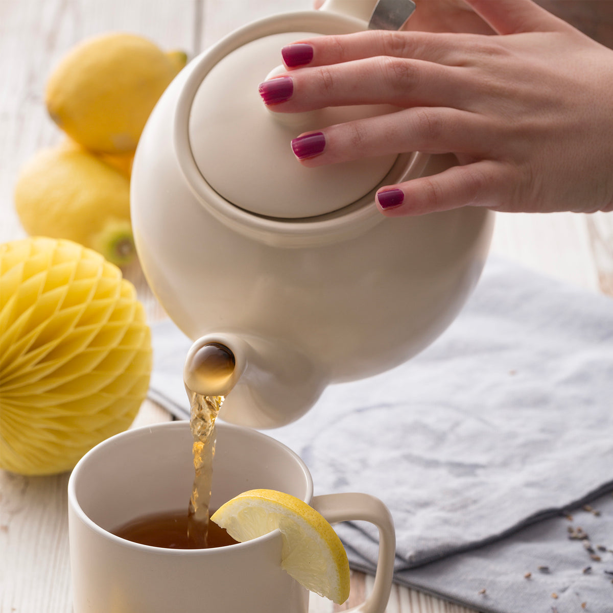 Cream-colored P & K Teekanne by Price & Kensington, featuring a classic porcelain teapot design.