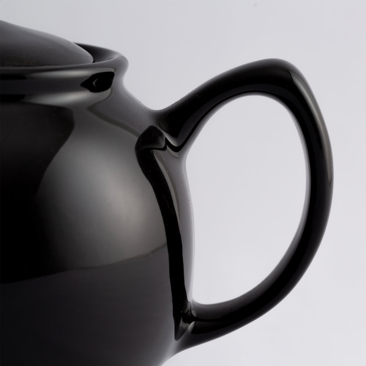 Black P & K Kensington teapot with a classic design, featuring a smooth spout and handle, perfect for brewing tea.