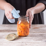 Clear KILNER screw-top canning jar with wide mouth and glass lid, designed for preserving food in a durable, transparent glass container.