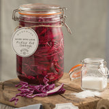 Clear KILNER Clip Round canning jar for preserving, made of durable glass with a secure clip lid for storing homemade preserves.