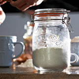KILNER clear round canning jar with metal clip lid, glass preservation container for homemade jams and preserves.
