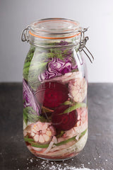 Clear KILNER clip round canning jar for preserving, made of durable glass with a secure clip lid.