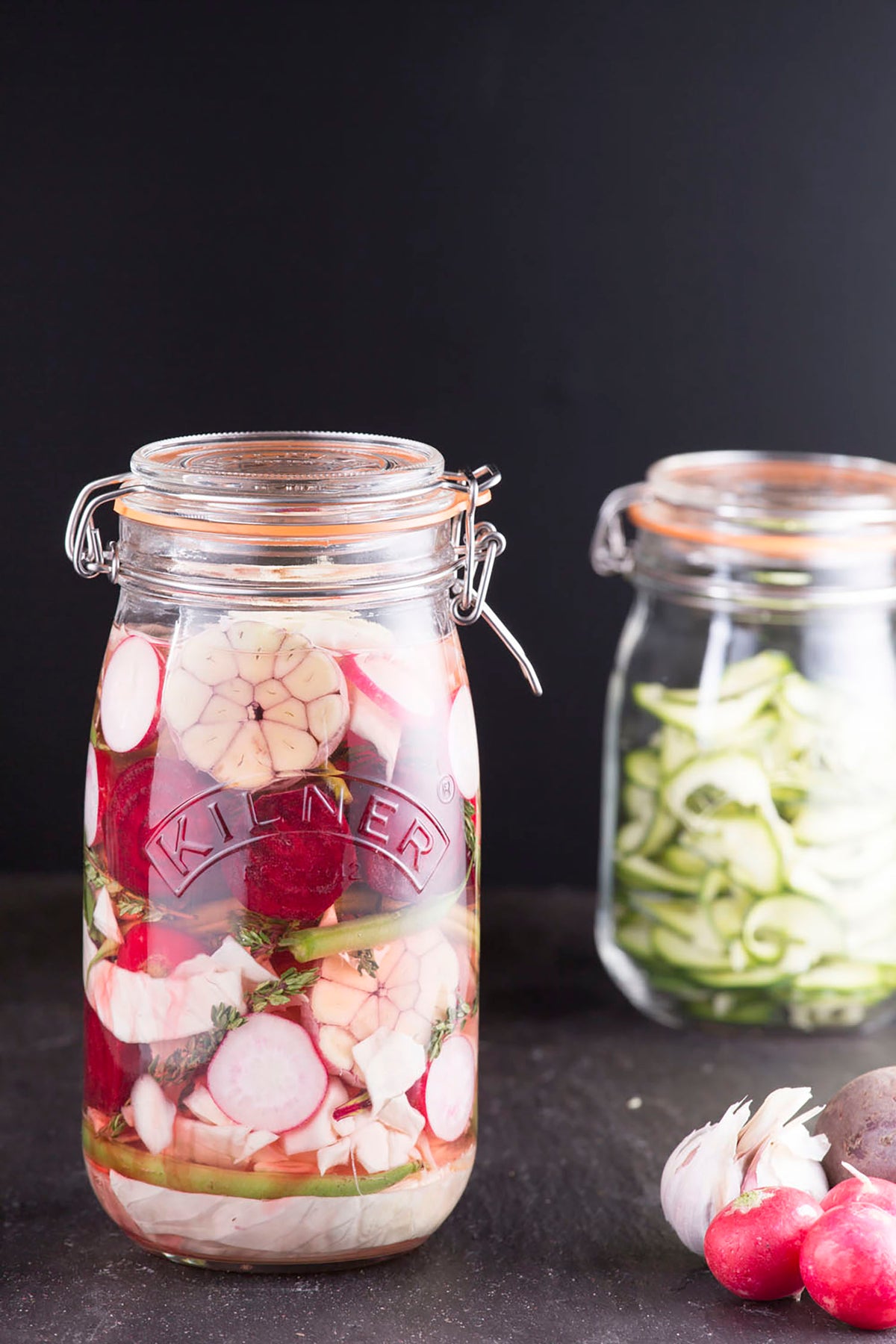 Clear KILNER Clip Round canning jar with metal clasp and rubber seal for preserving food and homemade jams.