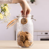 Clear KILNER clip round canning jar for preserving, with a glass lid and metal clip closure, ideal for food storage.