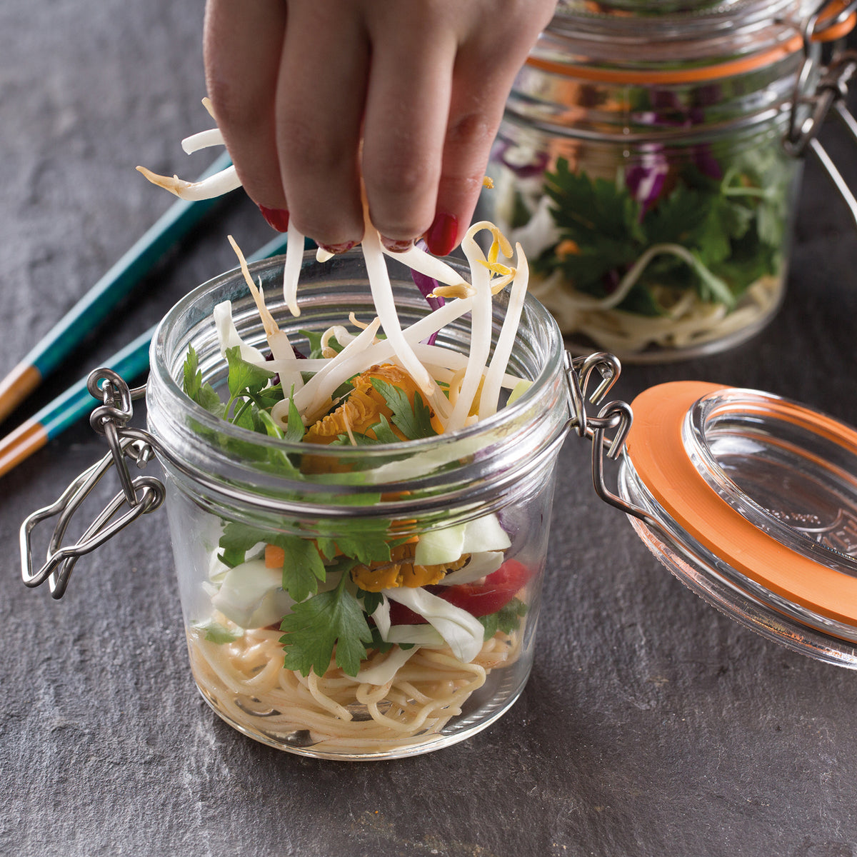 KILNER clip round clear canning jar with metal clasp and glass lid for preserving food and storing dry goods.