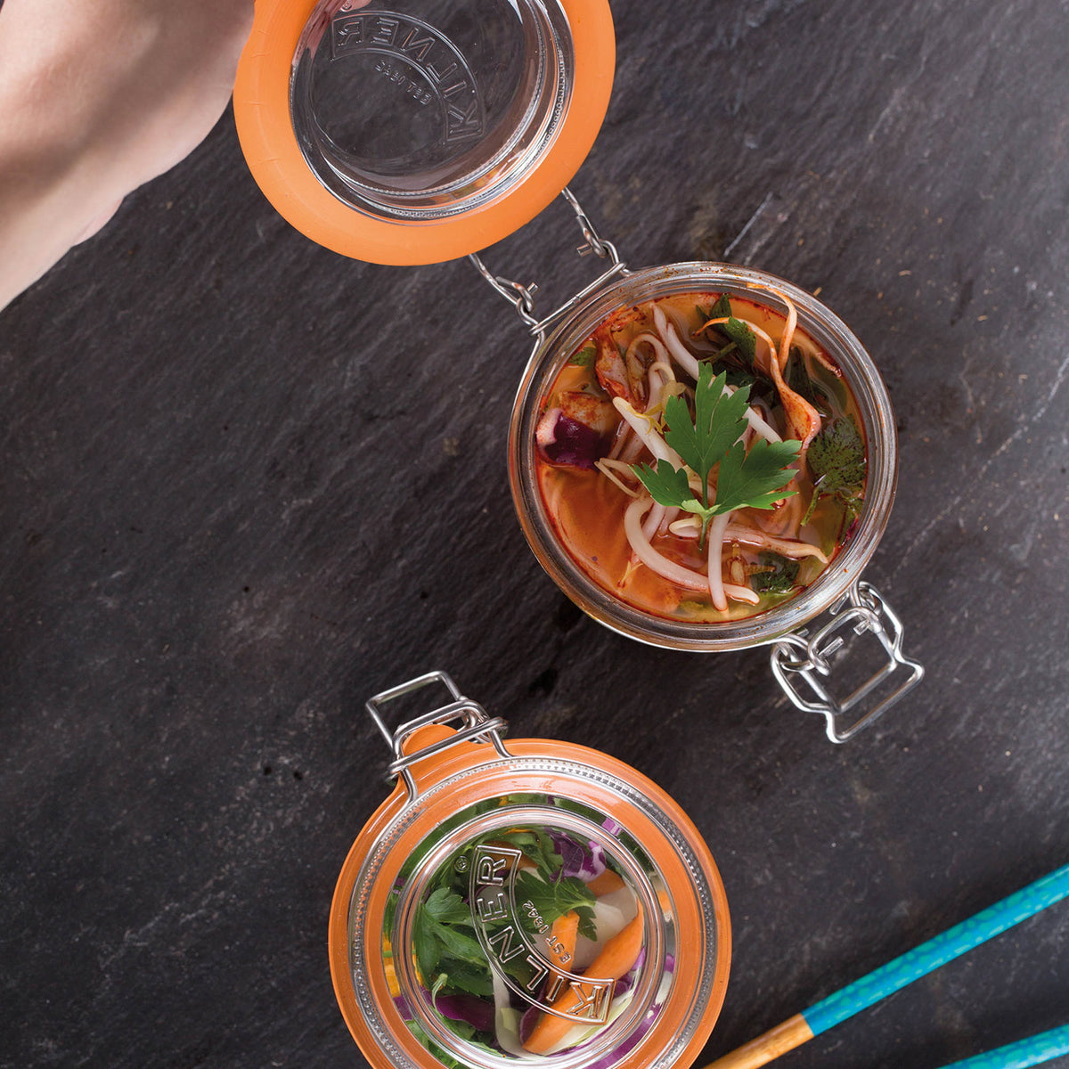 KILNER Clip Round clear glass jar for canning and storage, with metal clip lid and transparent appearance.