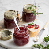 KILNER clear screw-top canning jar with glass lid for preserving food and jams, shown with secure screw closure.