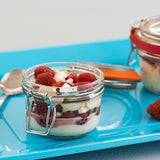 Clear KILNER clip round canning jar with metal lid and ring for preserving and storing food.