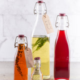 KILNER clear clip square canning jar with metal clasp and rubber seal for preserving homemade jams and preserves.