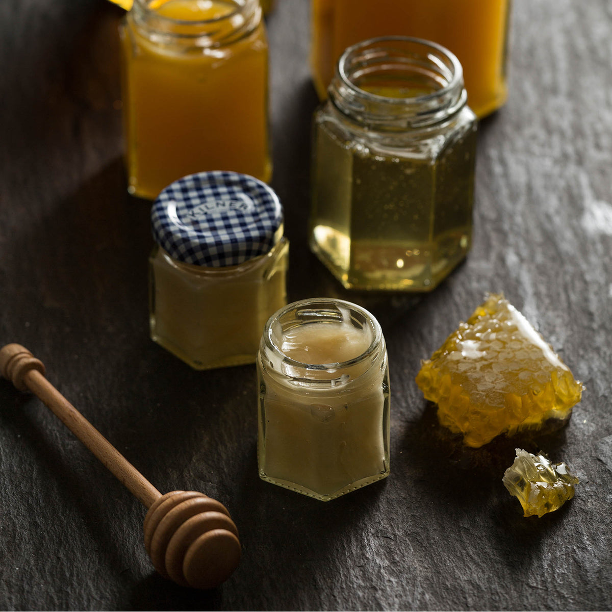 Clear Kilner canning jar with a 228 ml capacity, featuring a glass body and metal screw-top lid for preserving foods.
