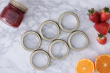 Set of six KILNER metal canning lids for jars, ideal for preserving and sealing homemade jams and preserves.