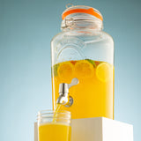 Clear 5L KILNER round beverage dispenser with spigot and glass body for serving drinks at gatherings.