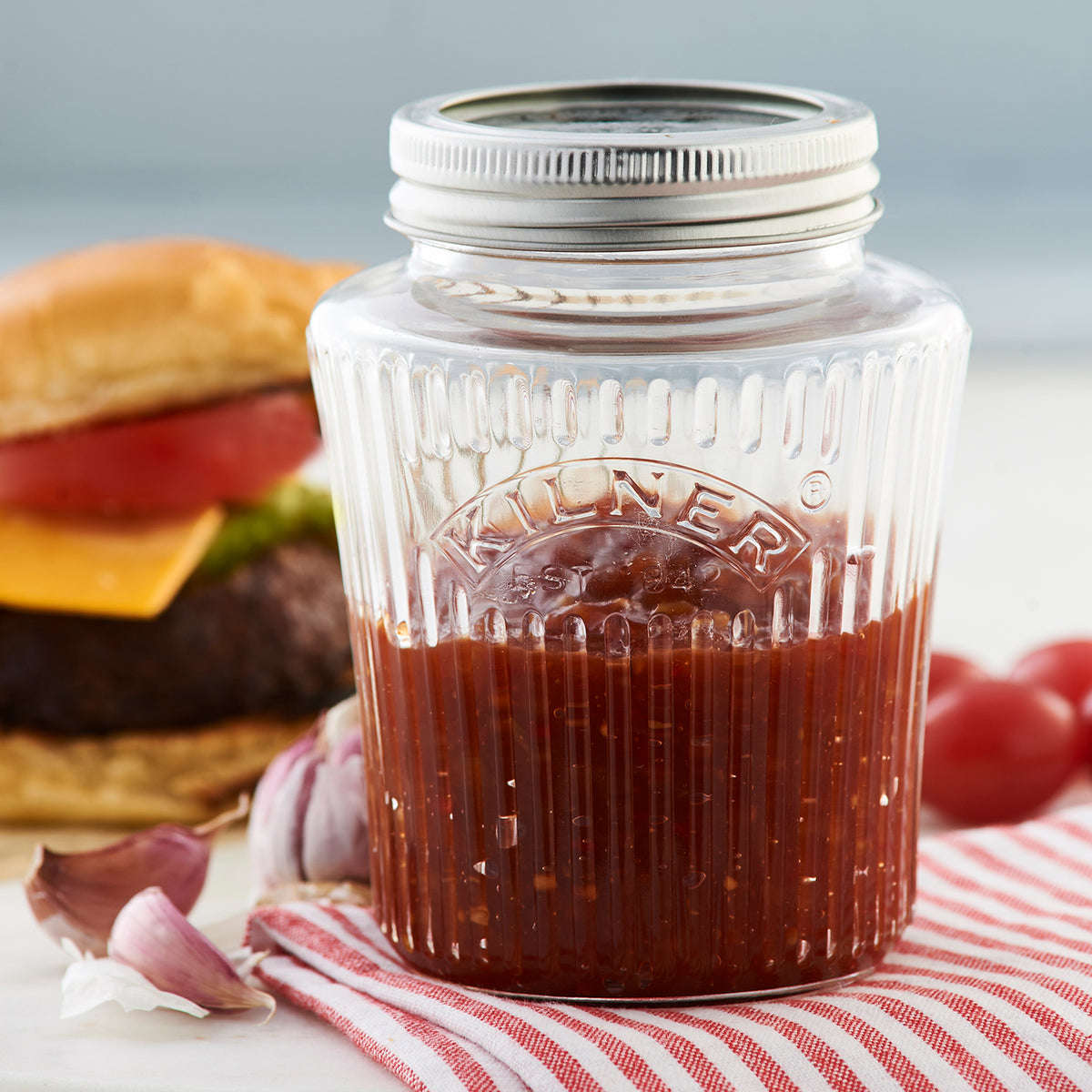 Clear vintage KILNER 500 ml preserving jar with a metal screw lid for canning and storage.