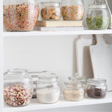 Kilner universal storage jar with a clear glass body and metal lid for storing dry goods or kitchen essentials.