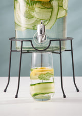 Black KILNER round stand for drink dispensers, sturdy and stylish, supporting beverage containers securely.
