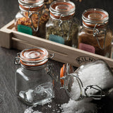 Set of six clear KILNER spice jars with metal lids, each holding 70ml, ideal for storing and organizing spices.