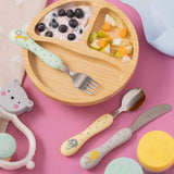 VINERS baby cutlery set with three stainless steel pieces, designed for children's use and easy handling.