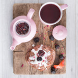Pink teapot from PRICE & KENSINGTON, P & K, with a smooth, rounded design and a matching lid, perfect for tea brewing.