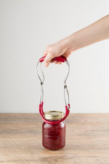 KILNER Einkochglas-Zange in red, metal jar tongs for handling hot jars during canning or preserving.