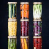 Clear KILNER wide-mouth canning jar with glass lid, showing its transparent, cylindrical design suitable for preserving foods.