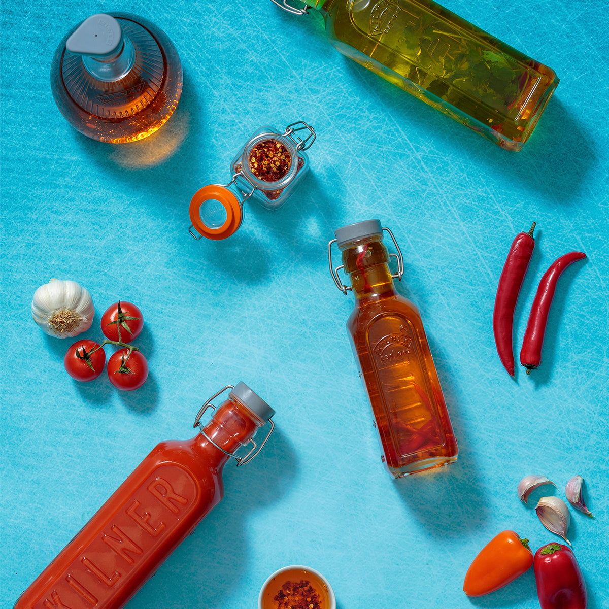 Clear KILNER Einkochflasche CLIP SQUARE for preserving fruits and vegetables, featuring a secure clip closure and glass construction.