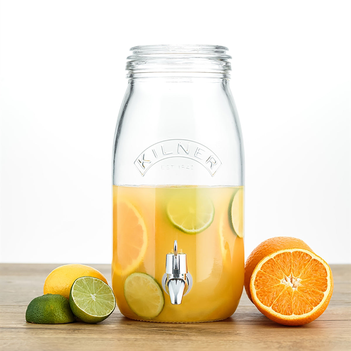 KILNER clear 3L drink dispenser with spigot and lid, made of glass, suitable for beverages and party drinks.