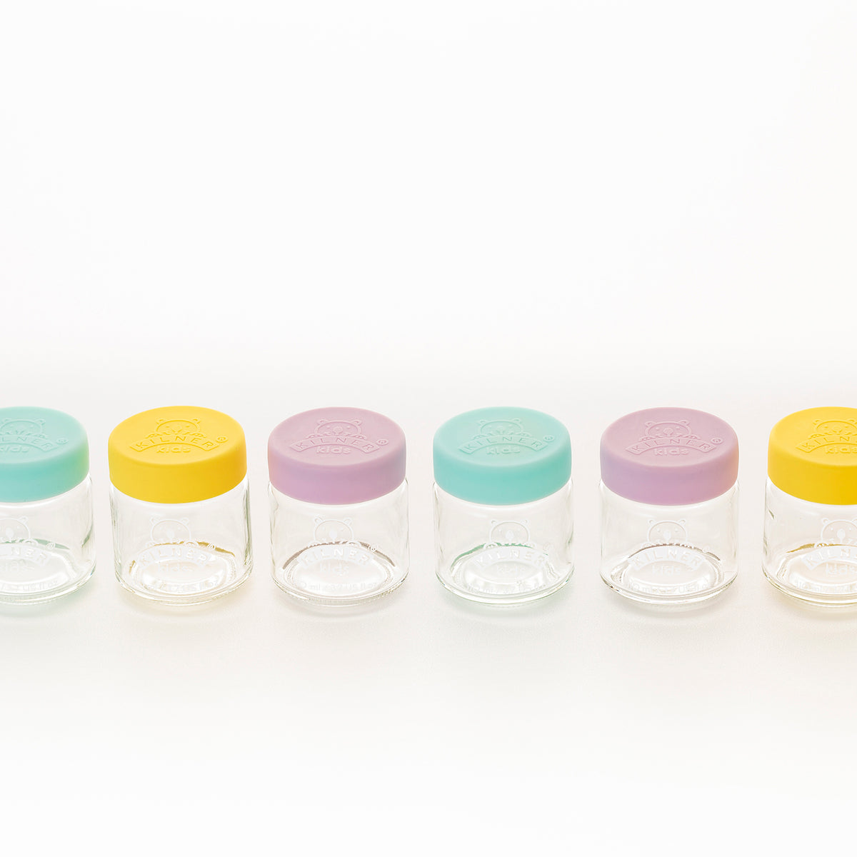 KILNER Babygläser set with clear and colorful baby-themed glass jars, suitable for storing baby food or snacks.