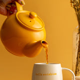 Yellow P & K Teekanne by PRICE & KENSINGTON with a sleek ceramic design, ideal for brewing and serving tea.