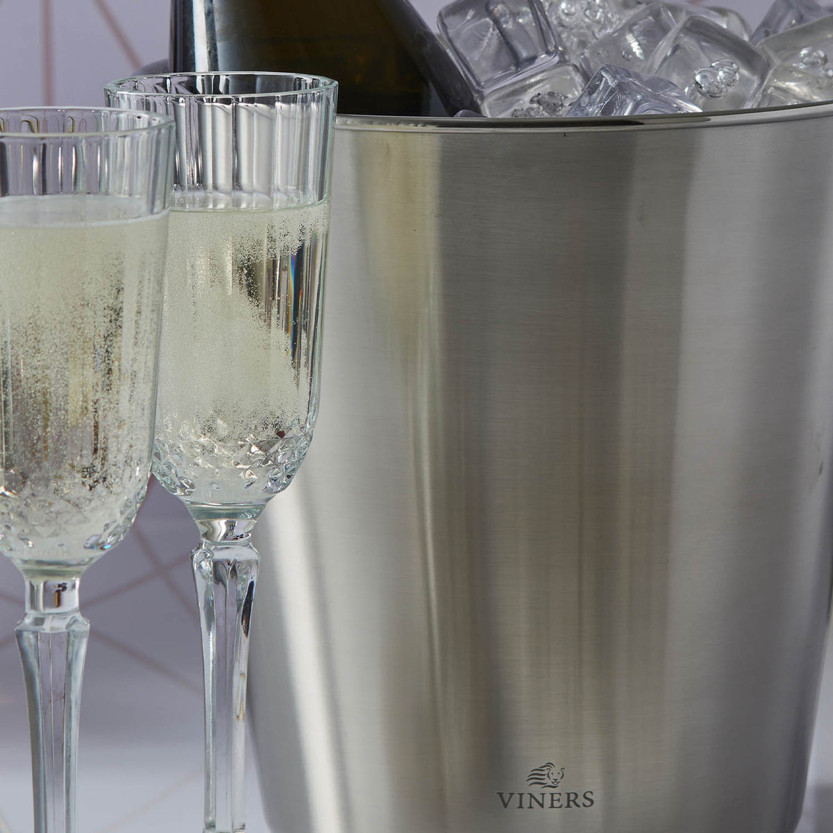 VINERS stainless steel champagne bucket in silver with a sleek, modern design for chilling bottles.