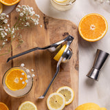 VINERS stainless steel double measuring cup with silver finish, showing measurement markings and handles for precise pouring.