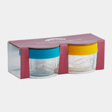 KILNER baby glass jars in clear and colorful designs, ideal for storing baby food or snacks, with vibrant patterns.