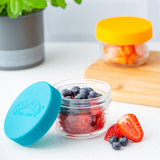 KILNER Babygläser set with colorful, clear glass jars for baby food storage, featuring playful designs and secure lids.