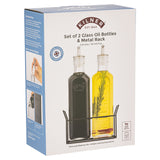 KILNER clear oil and vinegar bottles with glass stoppers, ideal for kitchen condiment storage and display.
