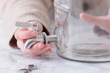 KILNER stainless steel tap for beverage dispensers with a sleek, durable design and easy-to-use spout for pouring drinks.