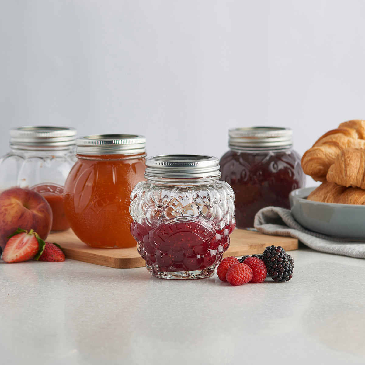 Clear KILNER marmalade jar with screw lid, transparent glass container for preserving jam and spreads.