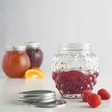 Clear KILNER marmalade jar with a wide mouth and metal screw-top lid, transparent glass for homemade jam storage.