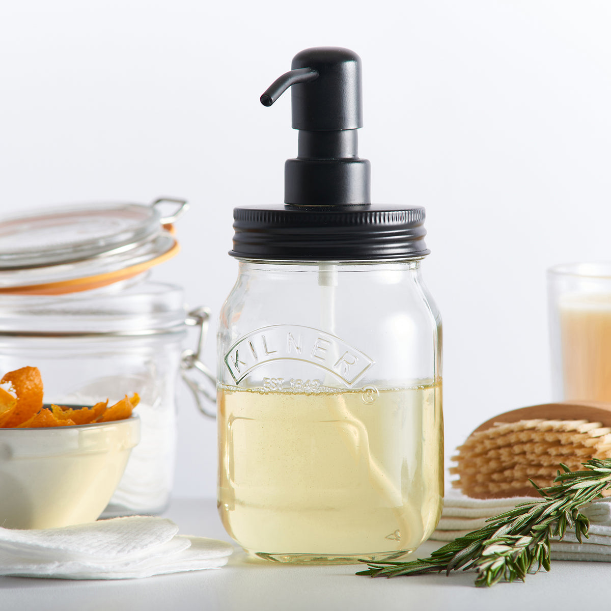 KILNER 0.5-liter soap and lotion dispenser with a clear glass body and metal pump for bathroom or kitchen use