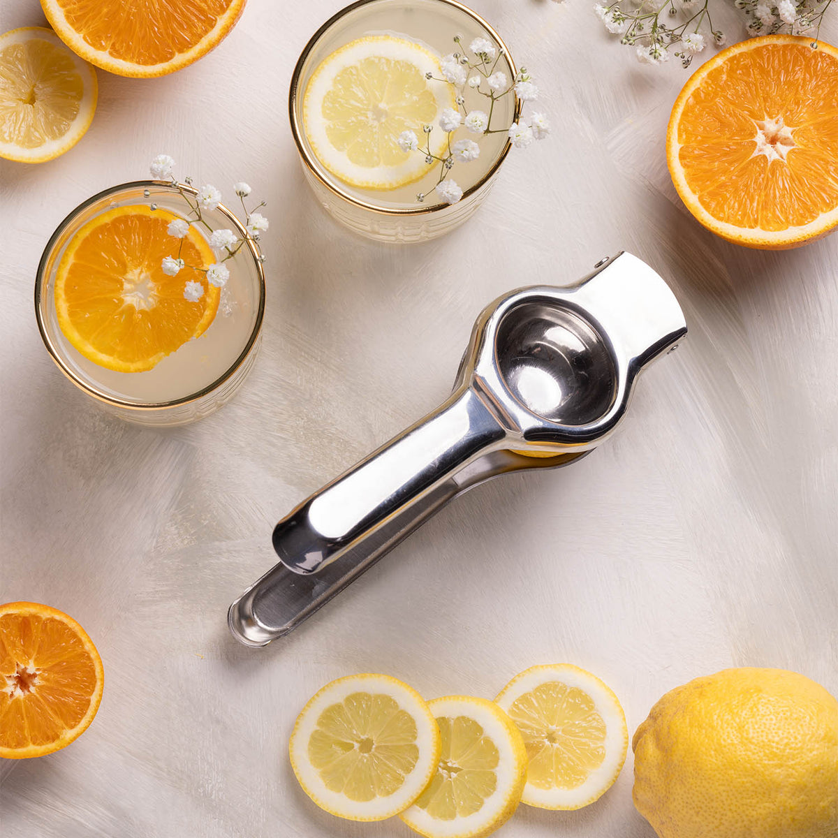 Stainless steel VINERS citrus juicer with a durable design for extracting fresh lemon juice.