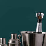 VINERS champagne opener with a sleek stainless steel design, perfect for opening sparkling wine bottles.