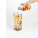 KILNER clear wide-mouth canning jar with metal lid for preserving and storing food, shown in a close-up view.